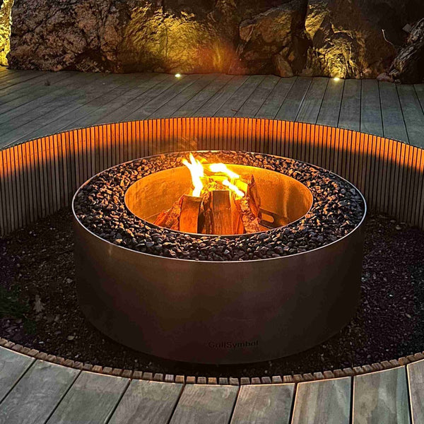 Grillsymbol Lunar Stainless Steel Fire pit at night burning